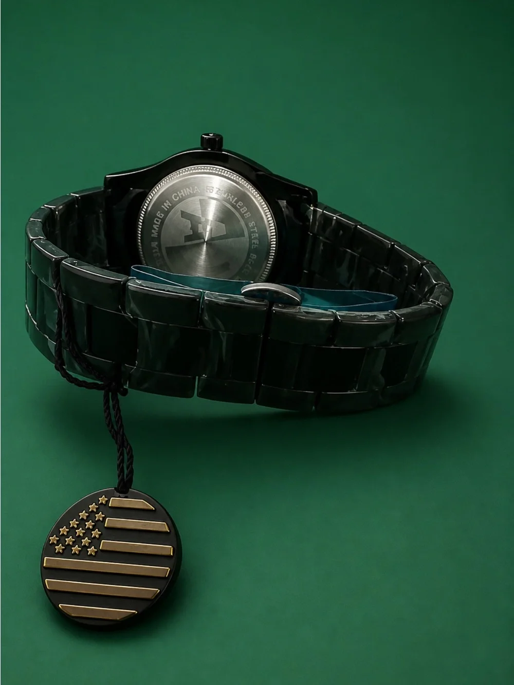 Black Bracelet Watch with Emerald Sunburst Dial and Date